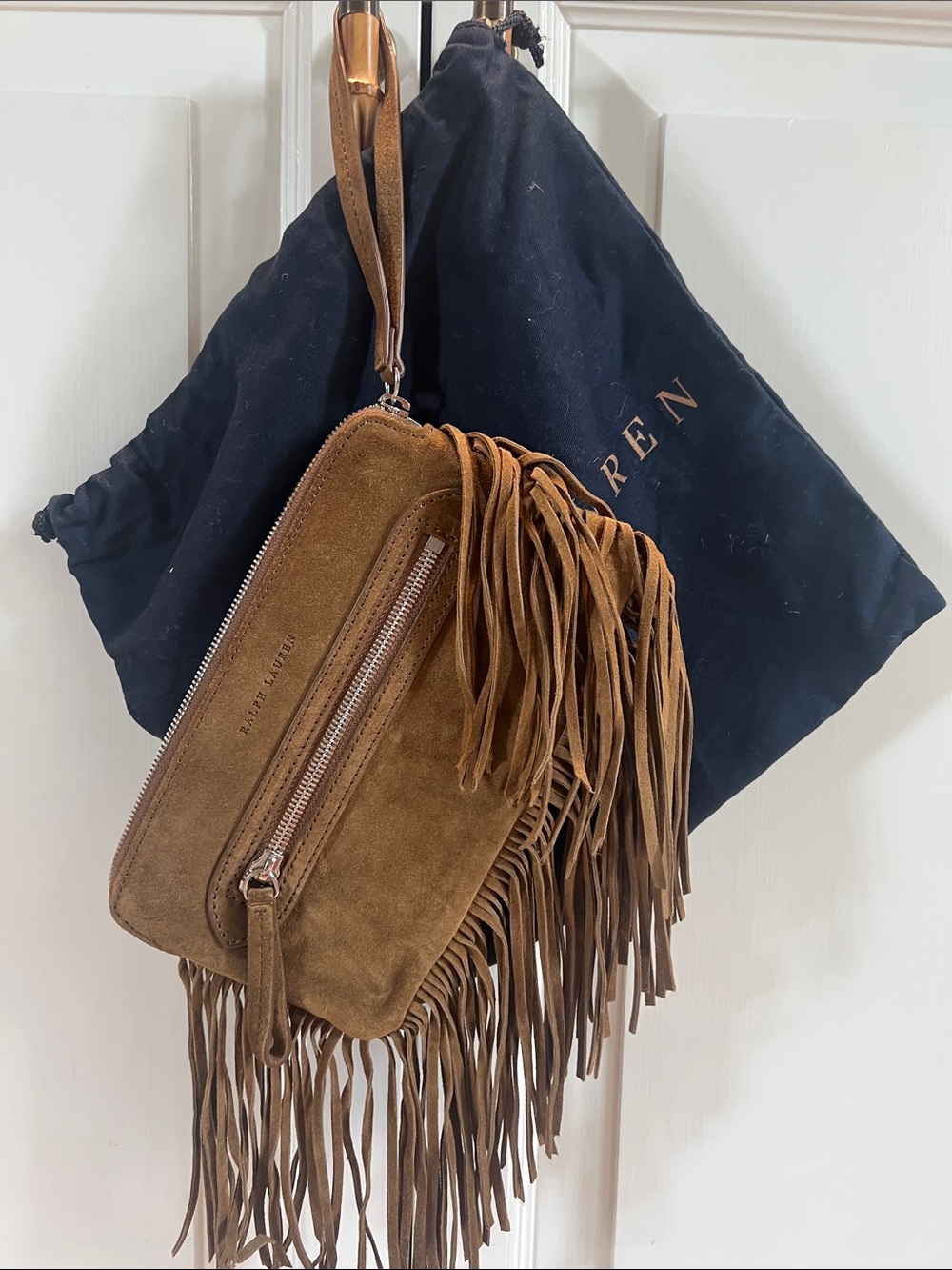 RALPH LAUREN suede fringe wristlet 
Never used.